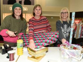 Volunteers wrap gifts in Maidenhead's Nicholsons Centre to raise funds for Thames Hospice