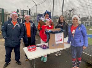 Maidenhead Hockey Club members donate items to Maidenhead Foodshare
