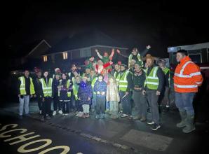 Santa with snow machine spreads festive cheer