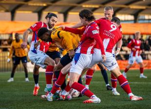 Late Carter blow leaves Slough two points from safety after Dorking comeback