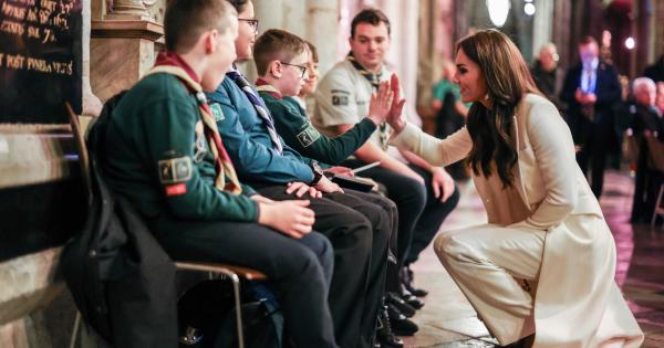 High fives from the Princess of Wales for Slough scouts at Christmas carol service