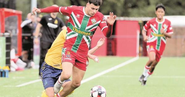 Windsor lose by the odd goal in seven against runaway leaders Amersham Town