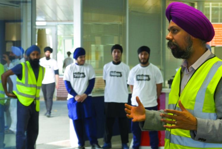 Slough Sikhs donate clothing for Punjab disaster relief at the Guru Maneyo Granth Gurudwara