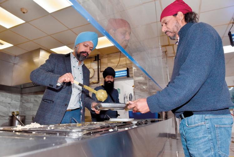 Sikh temple in Slough dishes out free meals for Langar Week