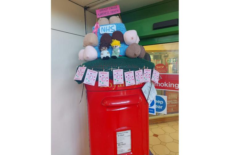Slough knitting group creates post-box topper to mark Breast Cancer Awareness Month