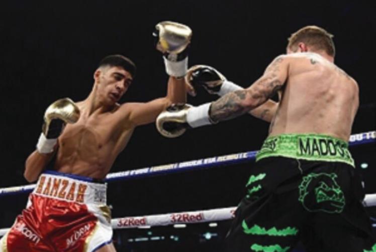 Teenage boxer wins first fight in style after going pro