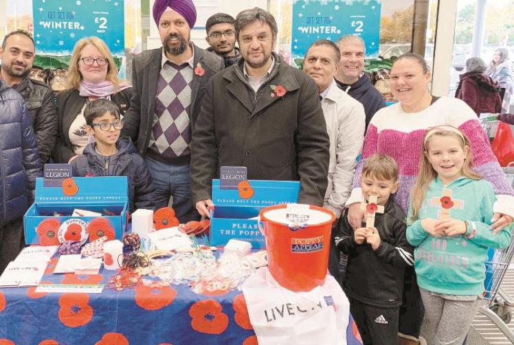 Slough MP Tan Dhesi joins Ahmadiyya Muslim community poppy sales