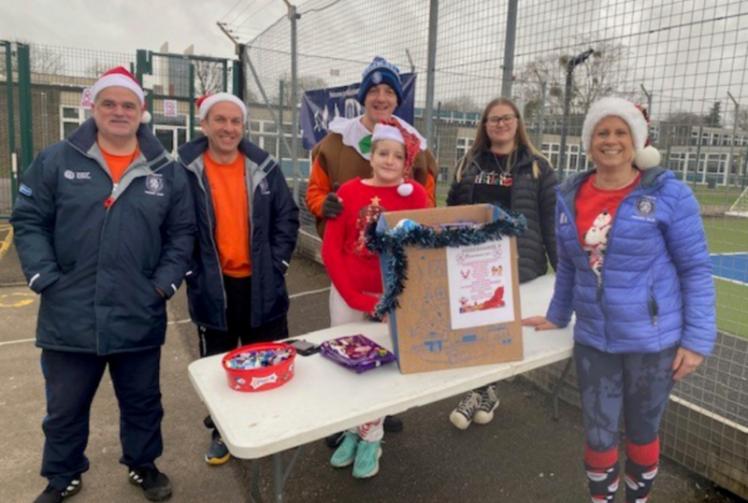 Maidenhead Hockey Club members donate items to Maidenhead Foodshare
