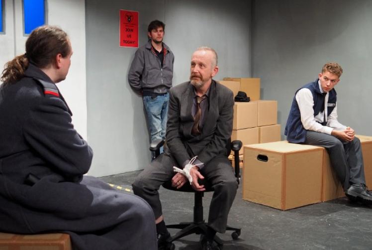 Darkly funny kidnapping four-piece has battle of ideology versus cynicism